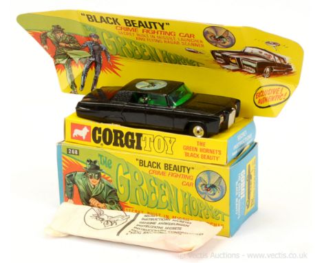Corgi 268 "The Green Hornet" - Black Beauty - finished in black, green tinted windows, spun hubs - overall condition is gener