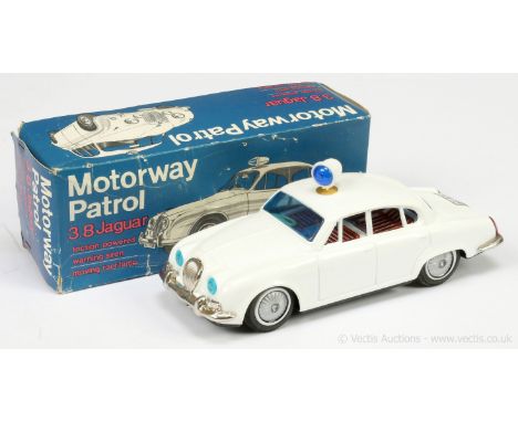 Chicko (Korea) tinplate Motorway Patrol Jaguar 3.8 "Police" Car - this friction drive issue finished in white, chrome trim wi