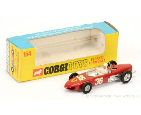 Corgi 154 Ferrari Formula 1 Racing Car - red body, chrome interior and trim, cast hubs, figure driver, racing number 36 on si