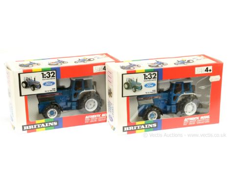 Britains 9508 Ford Tractor - a pair (1) TW-25 - blue, off-white, figure driver &amp; (2) same as (1) but 8730 - conditions ap