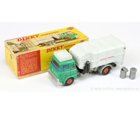 Dinky 978 Bedford Refuse Wagon - green cab with light blue interior, silver chassis, black and pale grey tipping back with 2 