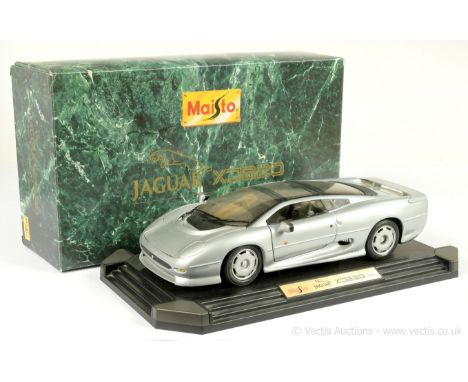 Maisto (1/12th scale) Jaguar XJ 220 (1992) - finished in sliver, black - overall condition is generally Near Mint - requires 