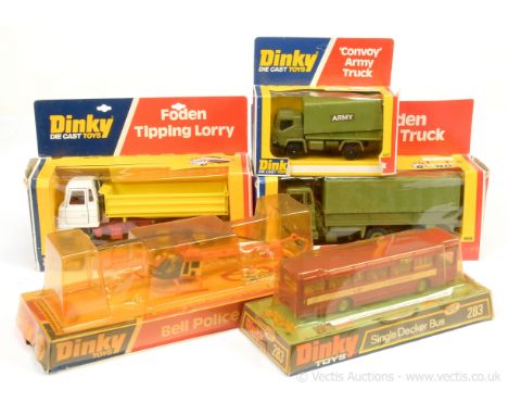Dinky group to include 432 Foden Tipping Lorry - white cab, red chassis and interior, yellow back and plastic hubs; 668 Foden