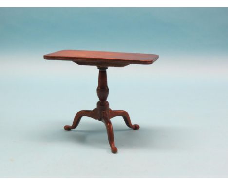 A Georgian-style miniature mahogany tripod table, rectangular top tilting on turned stem, top 9 x 5.5in. together with a pain