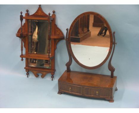 An Edwardian inlaid rosewood wall-shelf, with bevelled mirror backs, front turned columns, 2ft. 2in. high, and a bow-fronted 