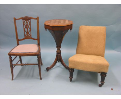 A Victorian inlaid walnut games-work table, octagonal top with partitioned interior, tripod base, top 1ft. 4in., together wit