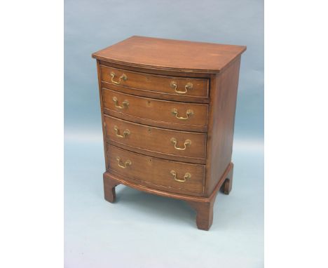 A Georgian-style mahogany bow-front chest, four graduated drawers with brass swan-neck handles, bracket feet, 1ft. 11in.