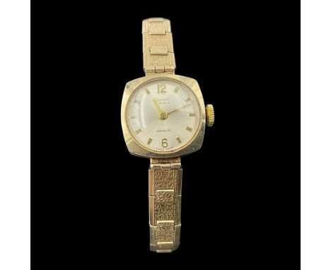 9ct gold Summit 17 Jewels ladies manual wind wristwatch, on 9ct gold articulated strap, stamped 375Condition Report:Total wei