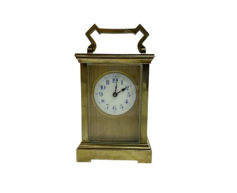 French - early 20th century 8-day brass carriage clock with a anglaise case and gilt dial surround, round enamel dial with bl