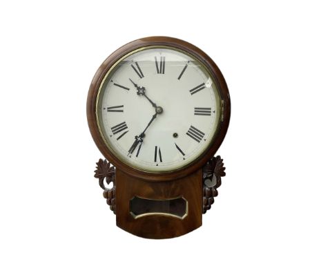 Late 19th century 8-day  drop dial wall clock in a mahogany case, carved ear pieces and glazed pendulum viewing glass, 12” pa