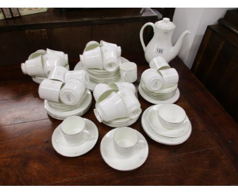 Royal Doulton dinner service - Mystique pattern.This is in very good condition with 12 tea cups but only 10 coffee cans.