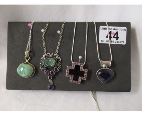 4 silver pendants, ruby amethyst etc