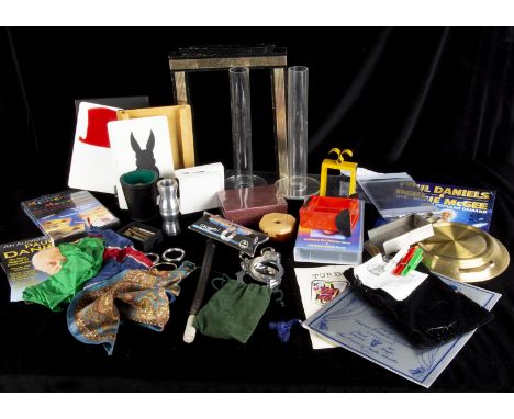 Tricks and Ephemera A selection of various tricks including a Leather Chop Cup with two balls and various Chop Cup instructio