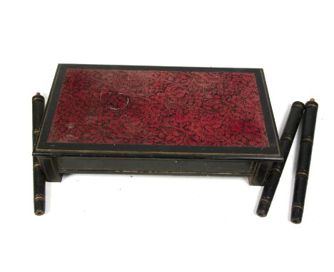 Illusion, An antique Mechanical Magic Table 20th Century  92cm x 51cm Black with gilt edging and a red and black floral fabri