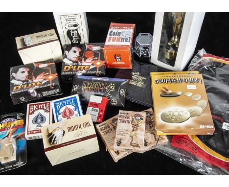 Tricks and Ephemera A box of merchandize including Two The Magic of D'Lite, two Change Bags, eleven Mouth Coils, a selection 
