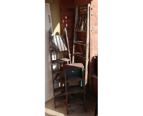 3 wooden step ladders 