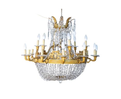 Empire chandelier with 16 lights in gilded bronze. ADDITIONAL PHOTOS, INFORMATION OF THE LOT AND SHIPPING INFORMATION CAN BE 