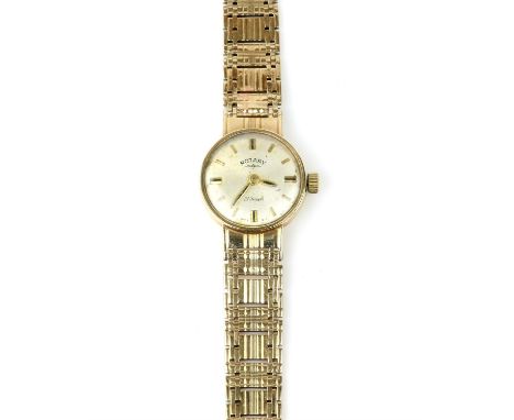 Ladies gold vintage Rotary wristwatch, circular cream dial with baton hour markers, on an integral bracelet, in 9ct yellow go