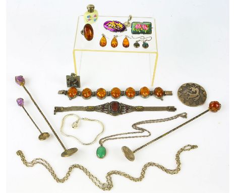 A group of silver jewellery, including a reconstituted amber bracelet, earrings and pendant, two enamel painted floral brooch