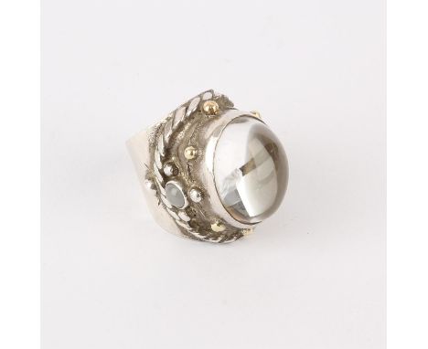 Silver ring by Michael A Bolton, set with an oval rock crystal stone, approximate ring size S/TCondition Report:  Gross weigh