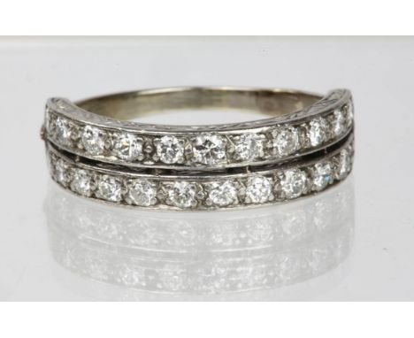 A two row diamond half eternity ring, set with old cut diamonds, weighing an estimated total of 1.00ct, mounted in tested 14c
