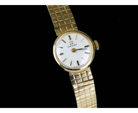 Ladies gold vintage Omega wristwatch, the signed cream dial with baton hour markers, fitted with a calibre 484 17 jewel manua