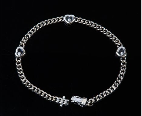 Chopard Happy Diamonds bracelet, three heart shaped compartments each containing a freely moving collet set round brilliant c