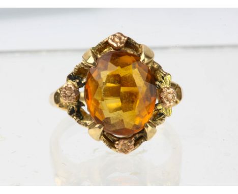 Citrine ring, an oval citrine, claw set in tested 14ct, with floral decorative features, ring size L, boxedCondition Report: 