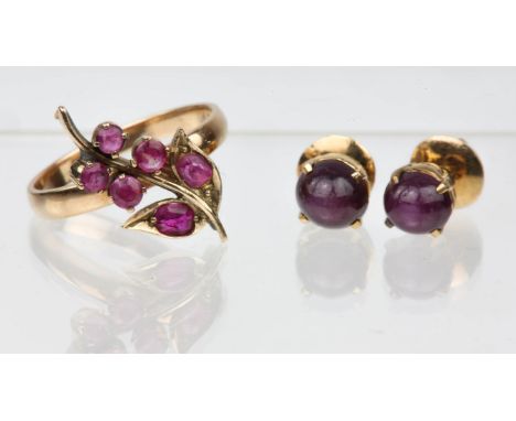 Ruby ring and earrings, a floral ruby ring set with four round and two oval rubies, all claw set, size K½, and a pair of star