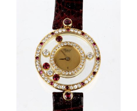 Chopard Happy Diamonds ruby and diamond wristwatch, round 23mm 18ct yellow gold case, featuring a gold dial, surrounded by ro