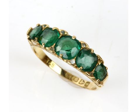 Five stone emerald ring in stamped 18ct gold shank, ring size O½, central stone is cushion cut, side stones are more rounded,