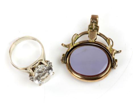 Goshenite and diamond ring, large oval cut goshenite, with three round brilliant cut diamonds set either side, in stamped 14c