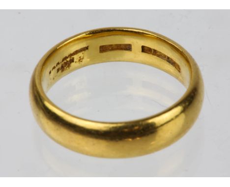 A 5.90mm gold wedding band, hallmarked 22ct, Birmingham, 1947, ring size PCondition Report:  Gross weight approximately 11.17