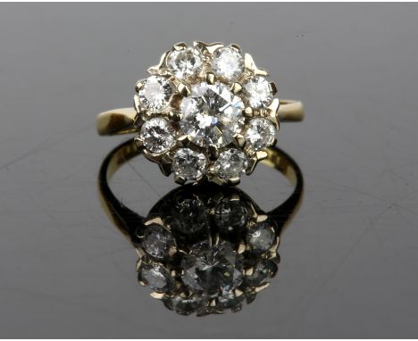 Diamond daisy cluster ring, with a central round brilliant cut weighing an estimated 0.58ct, surrounded by eight round brilli