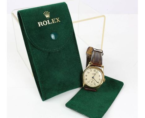 Men's 1940's Rolex, eggshell coloured face with Arabic hour markers and subsidiary seconds dial, 30mm case, blued steel hands