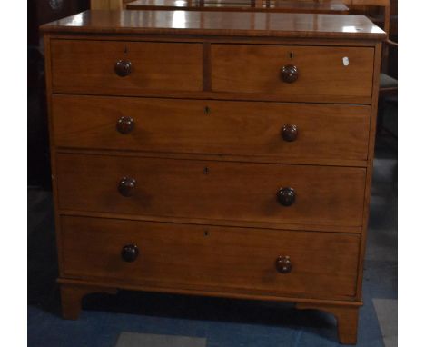 A 19th Century Mahogany Chest of Three Long and Two Short Drawers, with Turned Wooden Knob Handles, Supported on Bracket Feet