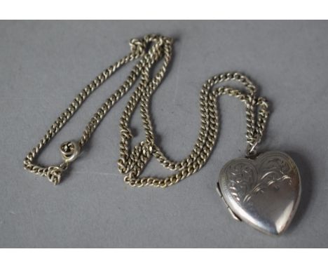 A Sterling Silver Love Heart Shaped Locket on Silver Chain 