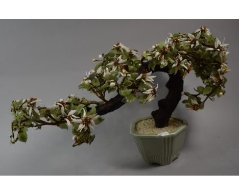 An Oriental Prunus Blossom Parted Glass Tree in Celadon Planter, 30cms High 
