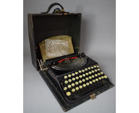 A Vintage Cased Portable Typewriter, 30cms Wide 