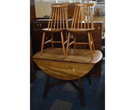 A Pair of Mid 20th Century Stick Back Dining Chairs together with a Drop Leaf Oak Topped Table on Unrelated Base 