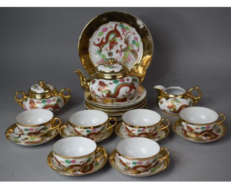A Oriental Egg Shell Tea Service with Dragon and Peacock Gilt Decoration Comprising Six Cups, Milk, Teapot, Lidded Sugar, Sau