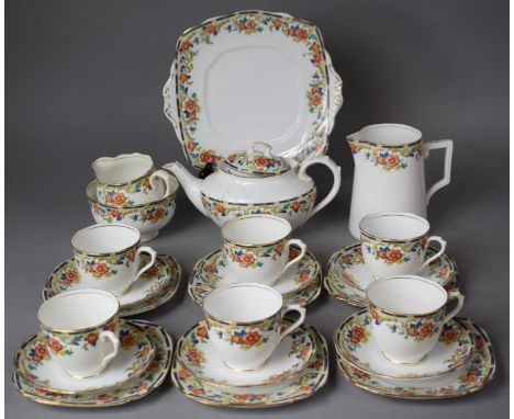 A Royal Albert Floral Pattern Tea Service to Include Water Jug, Milk Sugar, Six Cups, Teapot, Saucers, Side Plate, Cake Plate