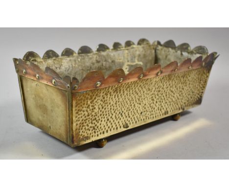 A Brass Rectangular Planter on Bun Feet with Hand Beaten and Cut Border Design, 31cms Wide 