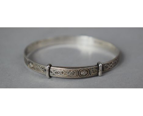 A Sterling Silver Babies Bangle Having Celtic Design 