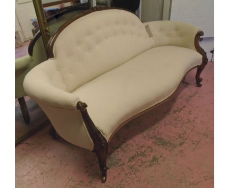 SOFA, mid Victorian walnut with carved floral showframe and white buttoned back upholstery, 87cm H x 188cm W x 77cm D.