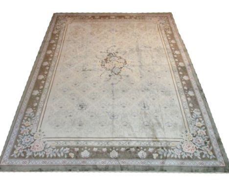 PURE SILK CANTONESE CARPET, 360cm x 270cm, floral medallion on an ivory field of bouquets within corresponding guard stripes 