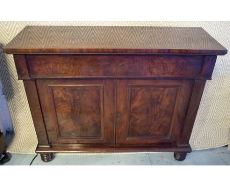 SIDE CABINET, William IV flame mahogany with frieze drawer, two panelled doors enclosing shelf and turned supports, 89cm H x 