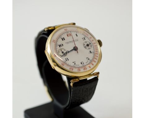 18K GOLD SINGLE BUTTON CHRONOGRAPH WRISTWATCH, with enamel dial and Tachometre scale by Eberhard.