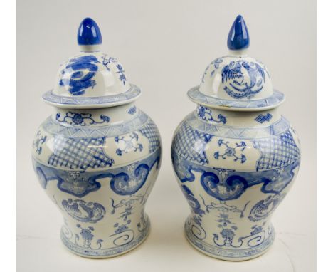 TEMPLE JARS, a pair, Chinese blue and white ceramic with covers, 47cm H. (2)