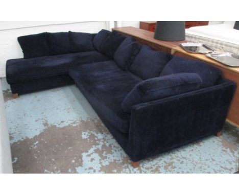 CORNER SOFA, by Flexform, in a Prussian blue velvet with goose down cushioning, on simple tapered wooden feet, 322cm x 322cm 